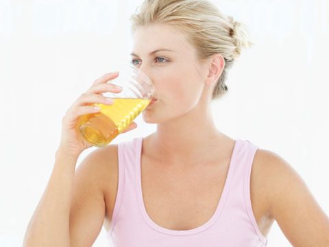 healing vinegar woman drinking juice