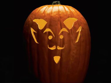 How do you use a pumpkin carving stencil?