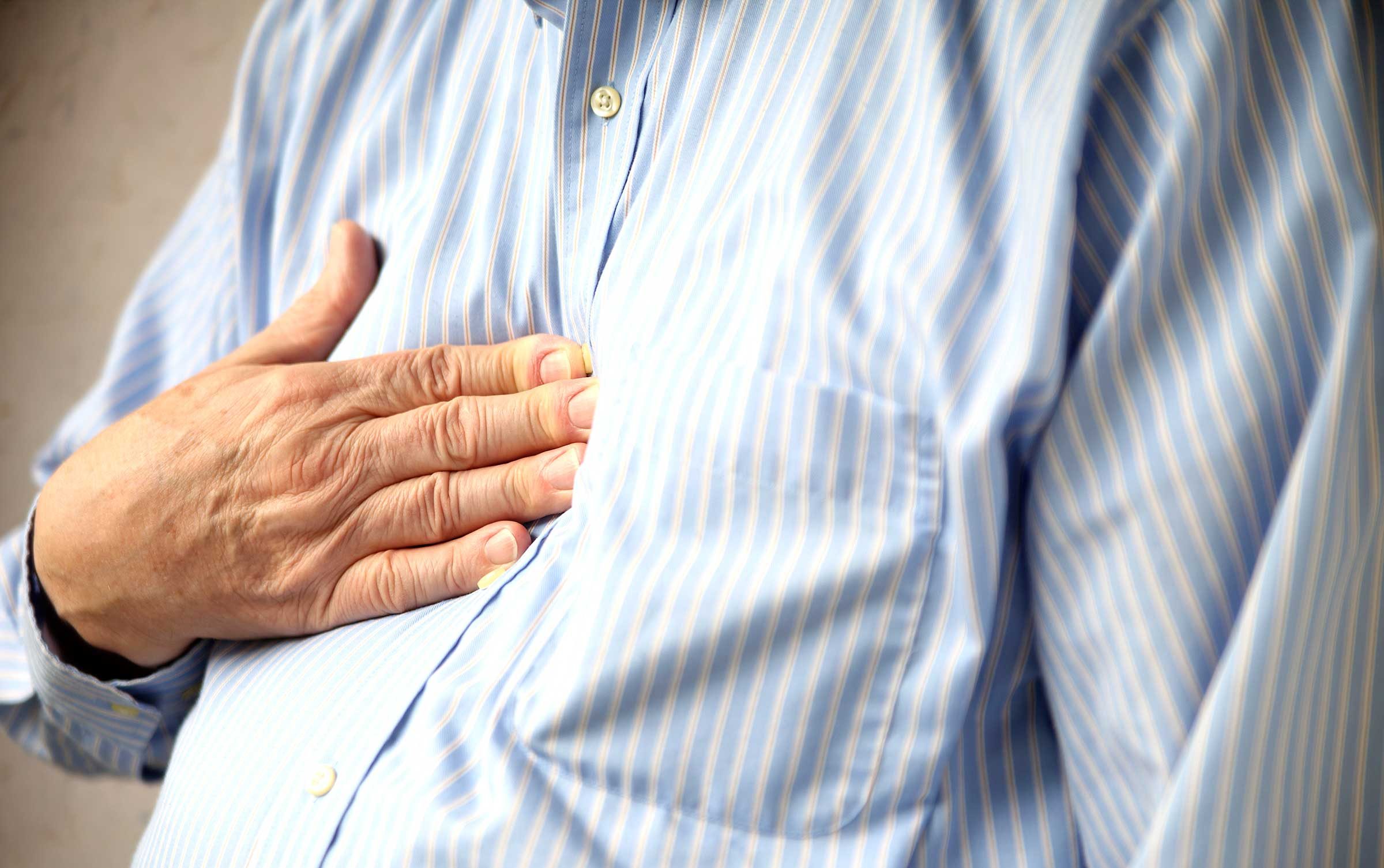 What could back pain with coughing indicate?