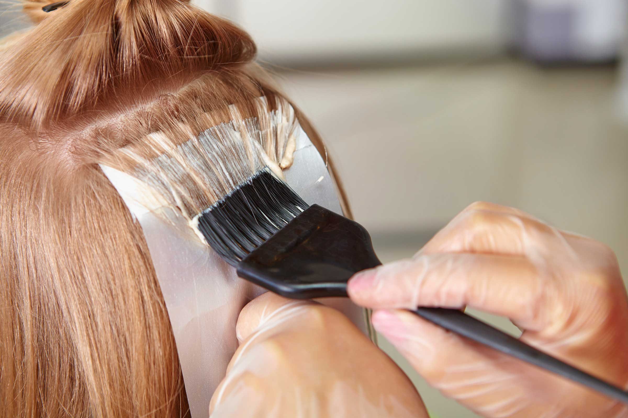 How long after using RID should you wait before coloring your hair?