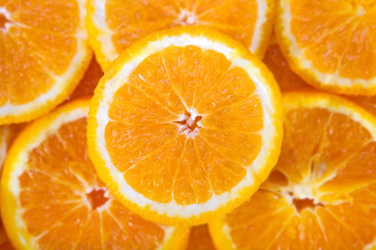 Abstract background with citrus-fruit of orange slices. Close-up