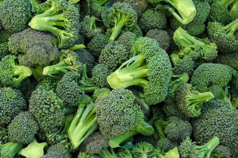 Broccoli in a pile on a market