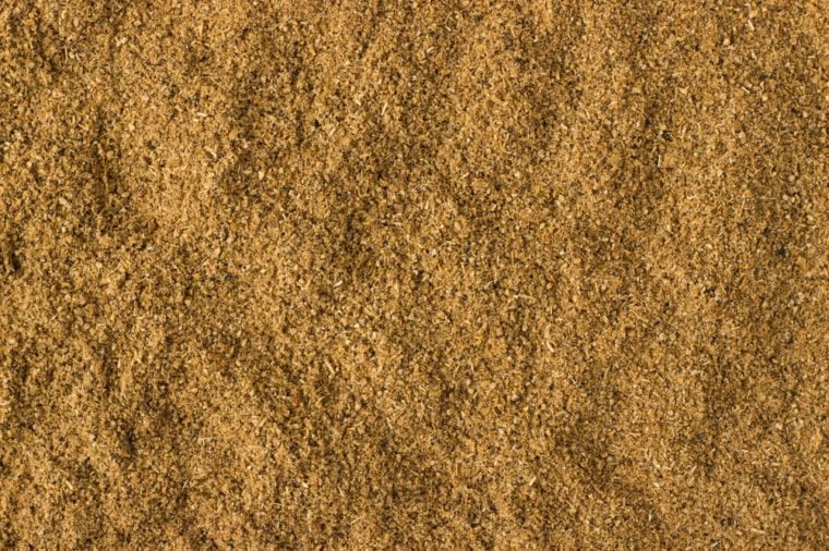 texture of Cumin powder close-up, spice or seasoning as background