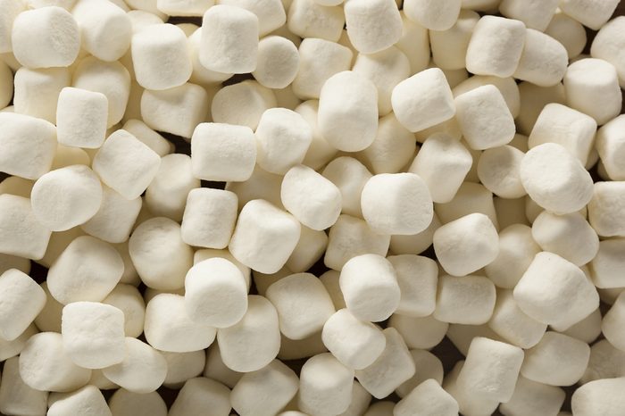 Unhealthy White Mini Marshmallows in a Bowl
