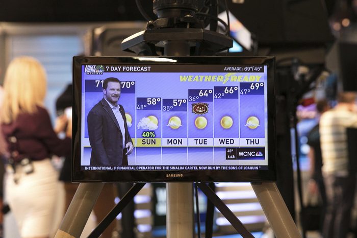 Dale Earnhardt Jr. delivers a surprise seven-day forecast at a Charlotte news station ahead of weekend NASCAR race in Martinsville to help launch Goodyear's new WeatherReady tire, in Charlotte, N.C