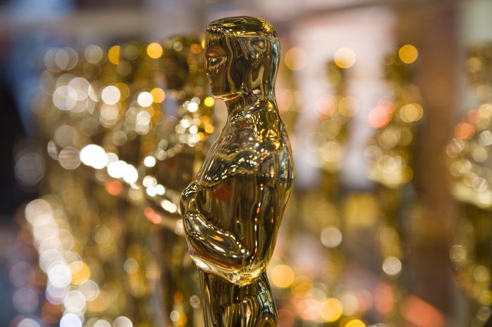 oscars statues. only front one in focus.