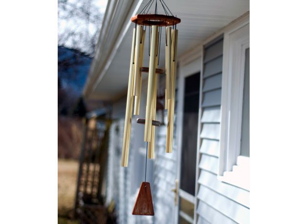 Chimes hang where outside wind to Wind Chimes