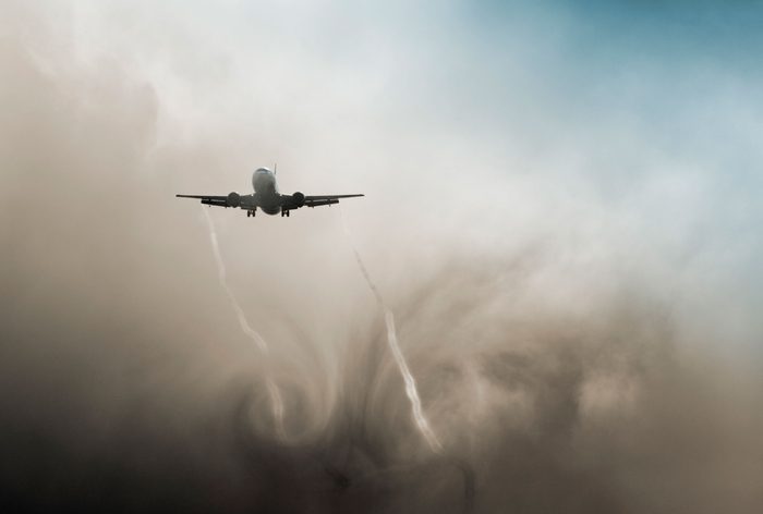 plane driving in foggy skies