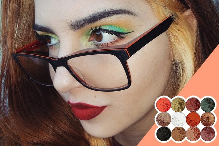 woman in glasses wearing colorful eyeshadow, with inset of eyeshadow pallet