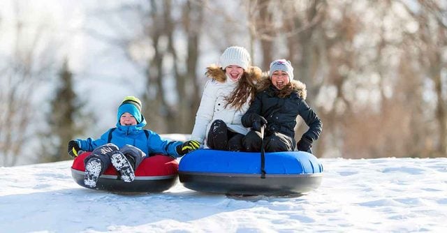 snowy_day_activities_whole_family_sledding_tubing