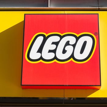 COLOGNE, GERMANY OCTOBER, 2017: Lego logo on a store front. Lego is a line of plastic construction toys that are manufactured by The Lego Group, a privately held company based in Billund, Denmark.
