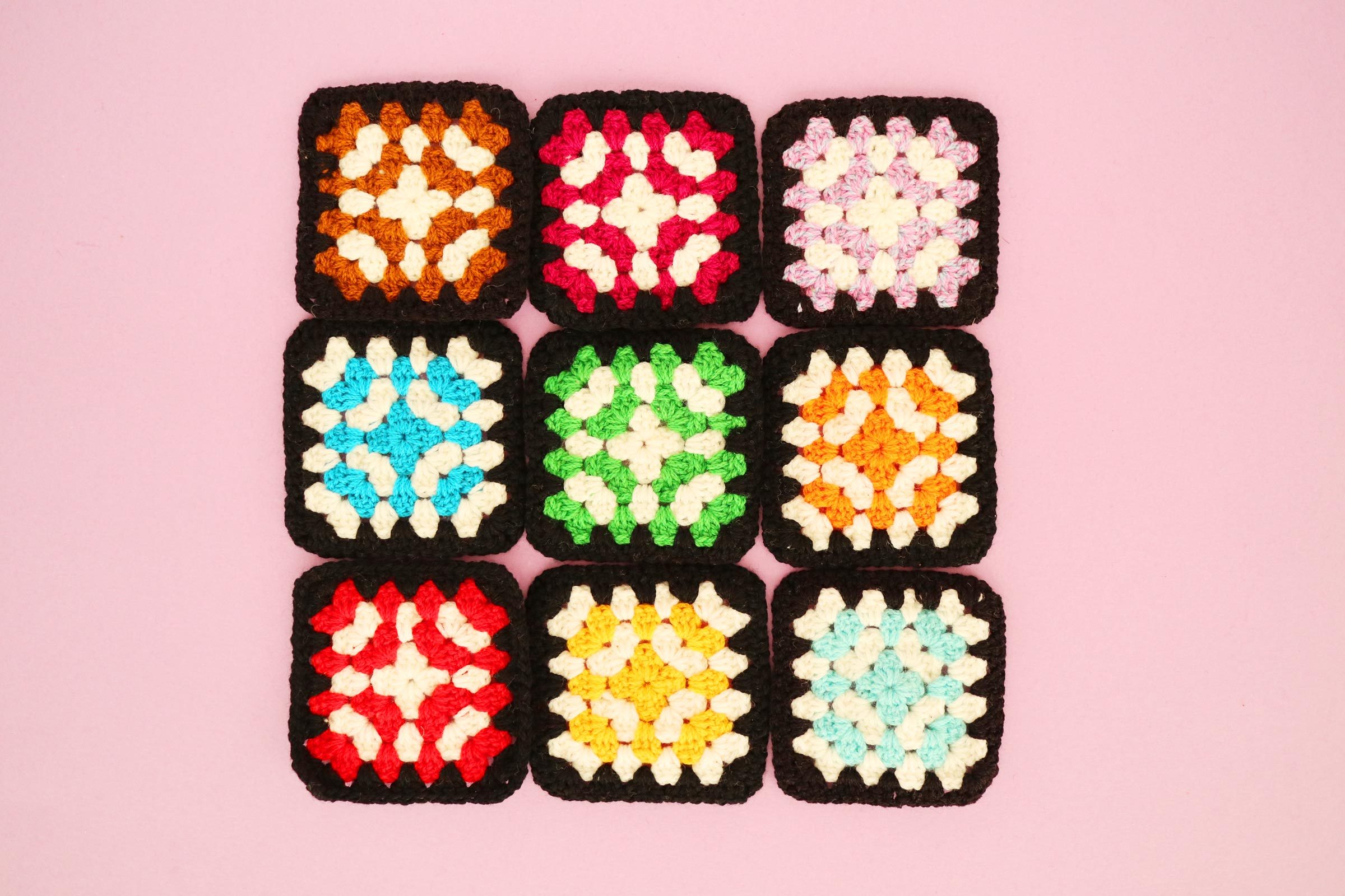 crochet squares on pink background