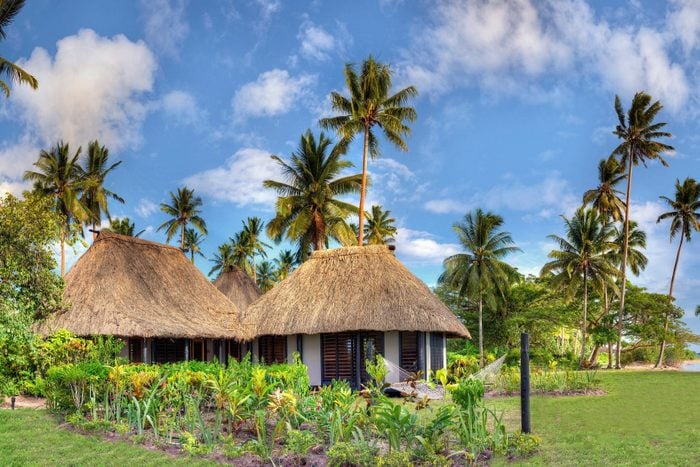 huts and palm trees at Jean Michel Cousteau resort