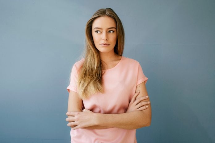 Portrait Of Young Woman Wearing Pink T Shirt