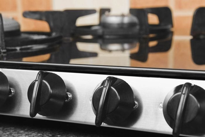 close up of knobs on a stove