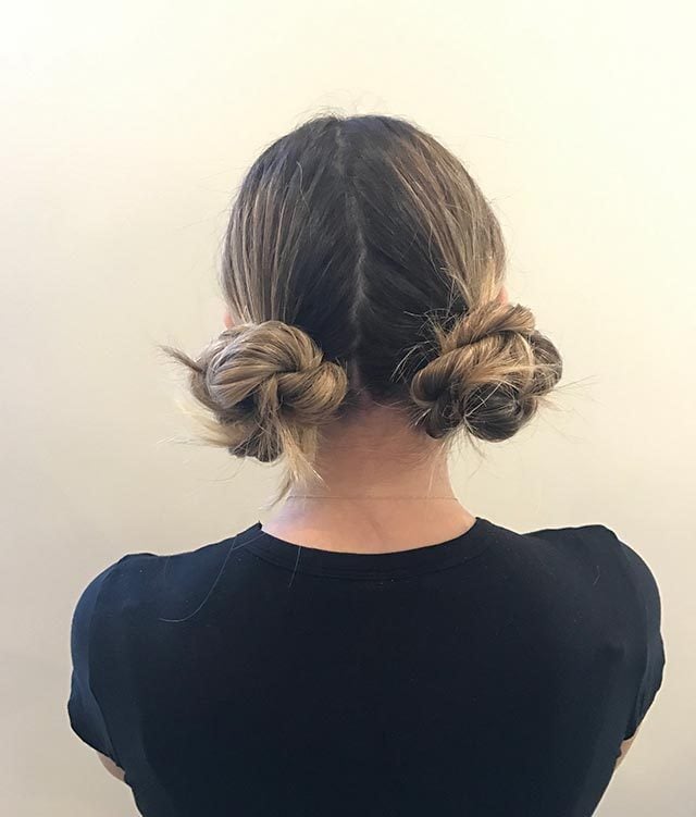 Image of Low space buns hairstyle