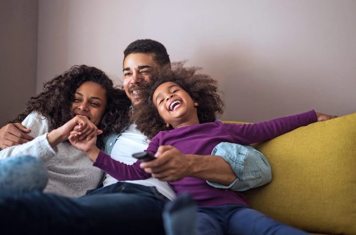 Mother, father and daughter having fun in the living room. Feeling happy and complete.; Shutterstock ID 568403428; Job (TFH, TOH, RD, BNB, CWM, CM): -
