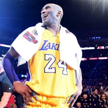 Kobe Bryant #24 of the Los Angeles Lakers celebrates after scoring 60 points in his final NBA game at Staples Center on April 13, 2016 in Los Angeles, California.