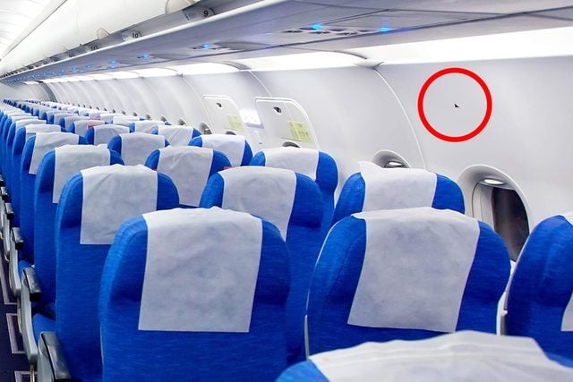 The-Hidden-Meaning-of-the-Triangle-Stickers-Above-Your-Airplane-Seat--117567658-My-Good-Images