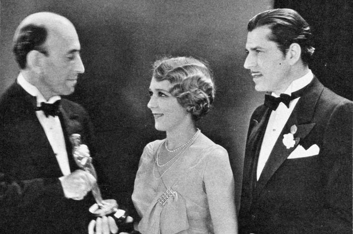 FILM STILLS OF 'COQUETTE' WITH AWARDS - OSCARS, 1929, ACCESSORIES, AWARDS - ACADEMY, WARNER BAXTER, BEST ACTRESS, WILLIAM C DeMILLE, OSCAR (ACADEMY AWARD STATUE), MARY PICKFORD, OSCAR RETRO, HOLDING AWARD, OSCAR (PERSONALITY) IN 1929 1929