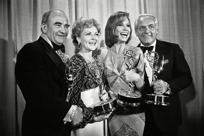 Mary Tyler Moore, Ed Asner, Betty White, Ted Knight Cast members of the "Mary Tyler Moore Show," pose with their Emmys backstage, at the 28th annual Emmy Awards in Los Angeles. From left are, Ed Asner, who plays the news director on the show but won his Emmy for his role in "Rich Man Poor Man"; Betty White, supporting actress; Ms. Moore for best actress in a comedy show and Ted Knight for supporting actor. At 89, White has become a role model for how to grow old joyously 18 May 1976