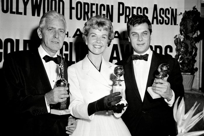 Day Curtis Adler Actress Doris Day, center, Tony Curtis, right, and Buddy Adler pose with their awards presented to them by the Hollywood Foreign Press Association at its annual awards dinner in the Cocoanut Grove in Los Angeles, Ca., . Day and Curtis were named best actress and actor in a poll conducted in 58 countries; Adler was presented the Cecil B. DeMille award by the association for outstanding contribution to the motion picture industry 26 Feb 1958