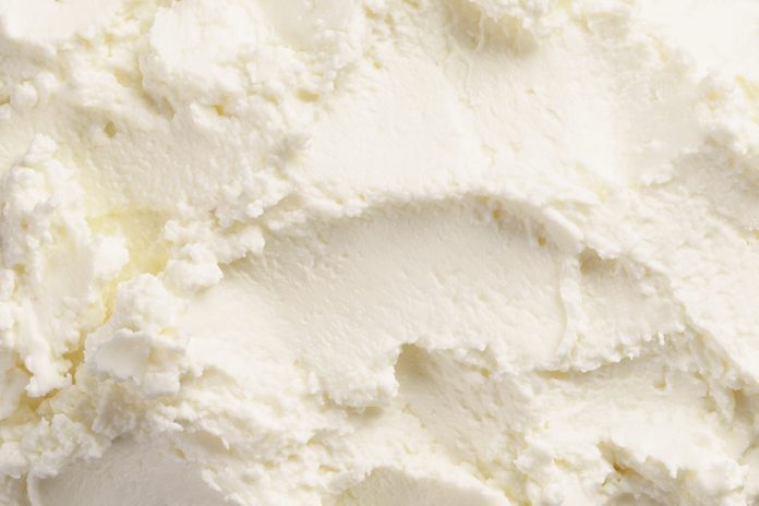close up texture of cream cheese like ricotta, food background