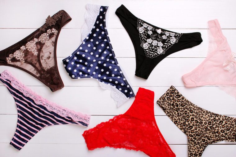 beautiful sexy panties on a wooden background. romantic lingerie.