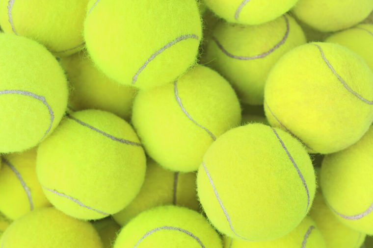 Lots of vibrant tennis balls