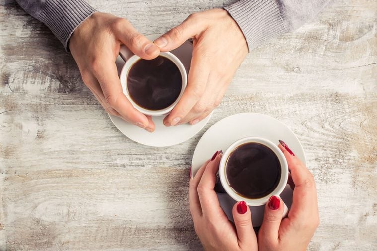 Hot coffee in the hands of a loved one.