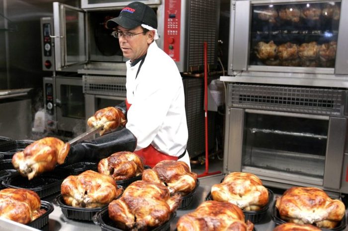 Costco A Costco butcher spreads out roasted chicken at Costco in Mountain View, Calif., . Monthly sales reports issued Thursday were better than expected, but still pointed to a consumer contending with rising gas prices, sagging home values and worries about jobs. Wal-Mart Stores Inc. and Costco Wholesale Corp. were among the top performers last month, while most mall-based apparel stores struggled