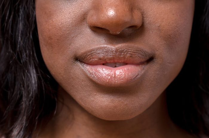 Close up Bare Lips and Nose of a Young African Woman