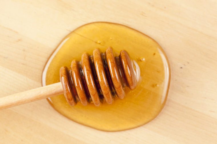 Golden Organic Honey against a back ground