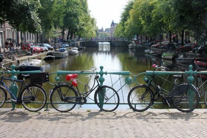 Bikes by a canal in Amsterdam, The Netherlands