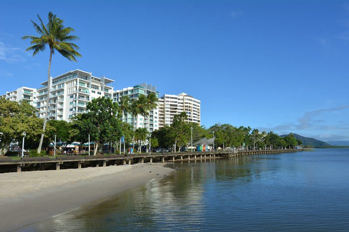 Cairns waterfront skyline in Queensland Australia at high tide.