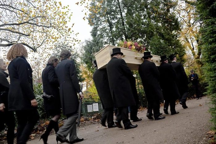 AMSTERDAM, THE NETHERLANDS - NOV 6: Mourners pay their respects at the funeral of Dutch author Harry Mulisch, November 6, 2010, Amsterdam, The Netherlands