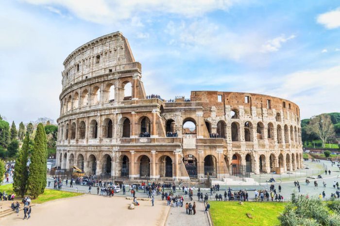 Magnificent aerial panoramnic view on the Great Roman Colosseum ( Coliseum, Colosseo ),also known as the Flavian Amphitheatre. Famous world landmark. Scenic urban landscape. Rome. Italy. Europe