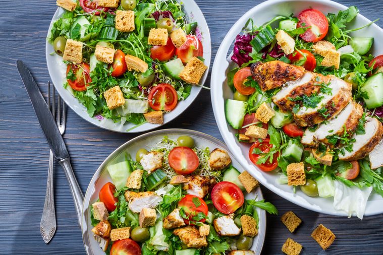 Healthy salads made of hot chicken and fresh