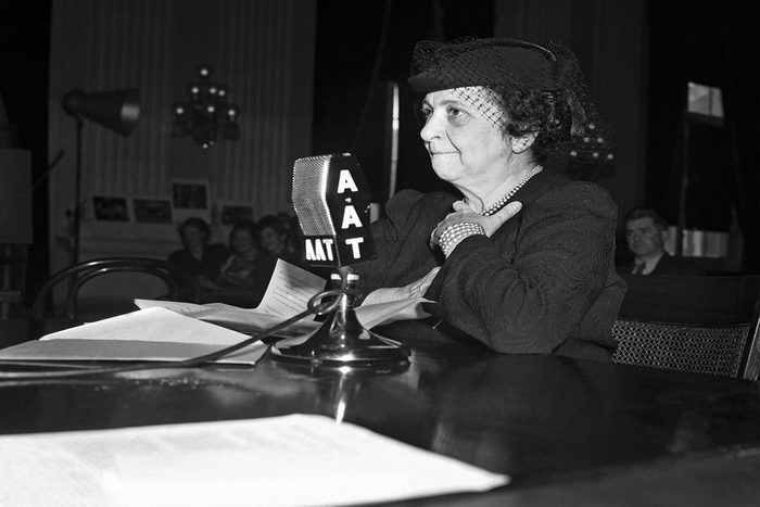 Frances Perkins Secretary of labor Frances Perkins testifies, before the house committee on interstate migration, advocating extension of the benefits of certain social legislation to the "Okies" and "Arkies," migrant farm workers she said the migrants should be placed under the wage-hour law, social security act and other legislation now covering other workers