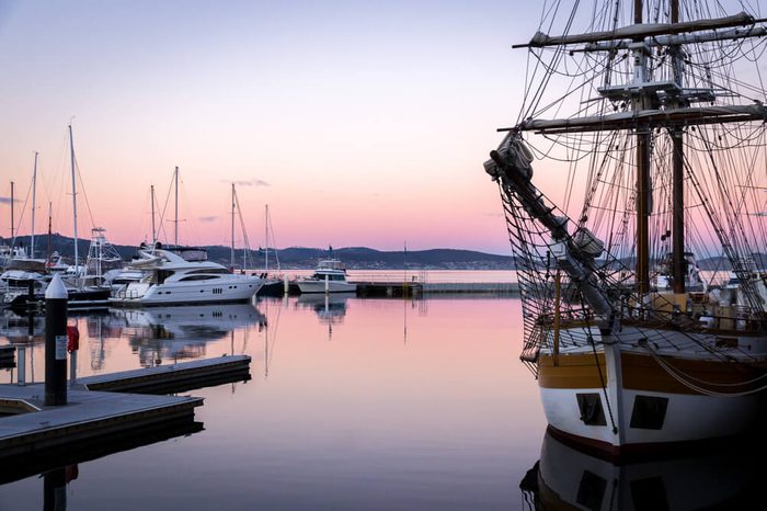 Sail boat at sunset in the port of Hobart, Tasmania