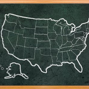 America map draw on grunge blackboard with wooden frame