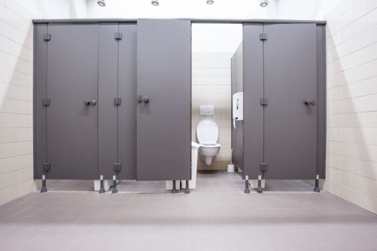 In an public building are womans toilets whit black doors