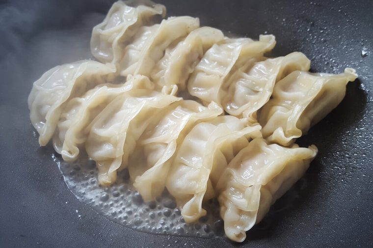 Close up fresh boiled gyoza dumplings with hot steams