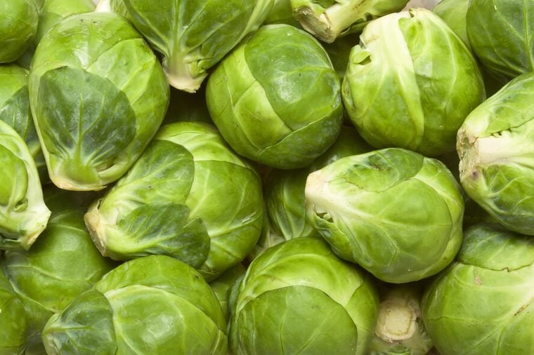 background or texture of fresh green Brussel Sprouts.