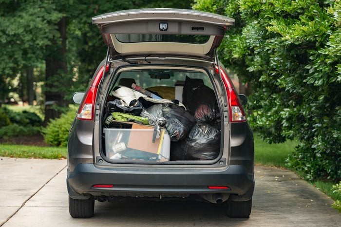 SUV packed quickly with belongings thrown in for move home from college