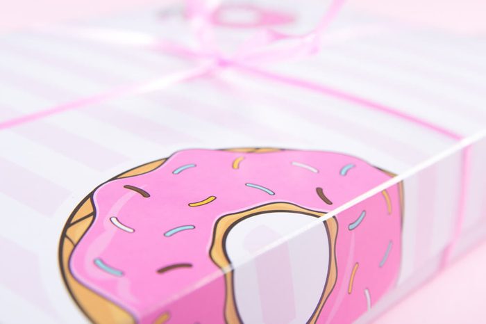Closeup pink bakery box for donuts