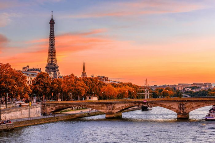 Sunset view of Eiffel tower and Seine river in Paris, France. Autumn Paris. Architecture and landmarks of Paris. Postcard of Paris