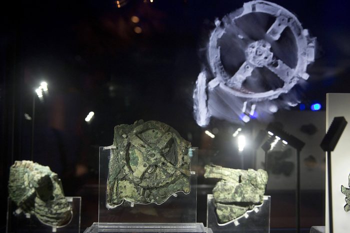 Fragments of the 2,100-year-old Antikythera Mechanism, believed to be the earliest surviving mechanical computing device, is displayed at the National Archaeological Museum, in Athens, Thursday, June 9, 2016. An international team of scientists says a decade's painstaking work on the corroded fragments found in an ancient Greek shipwreck has deciphered roughly 500 words of text that explained the workings of the complex machine, described as the world;s first mechanical computer