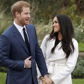 Dated, Britain's Prince Harry and his fiancee Meghan Markle pose for photographers in the grounds of Kensington Palace in London, following the announcement of their engagement. Speculation is mounting over who will be invited to the May 19, 2018, royal wedding of Prince Harry and Meghan Markle, with pundits guessing about the wedding guest list