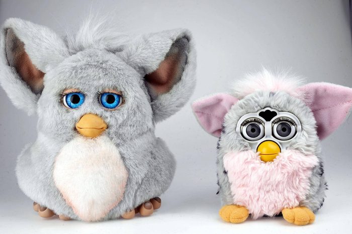The new version of the Furby interactive toy (L) with the old one. It can smile, frown and communicate more than 30 different emotions